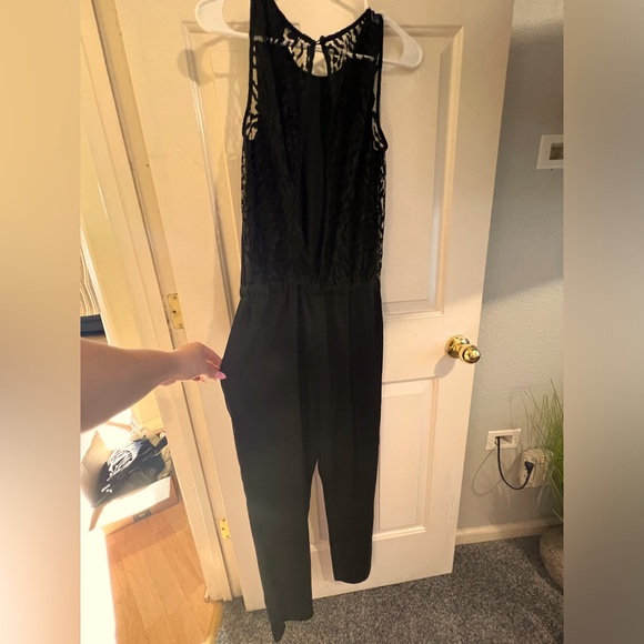 Sexy & Sophisticated BCBGMaxAzria Black Lace Detail Jumpsuit with Pockets - Picture 2 of 10